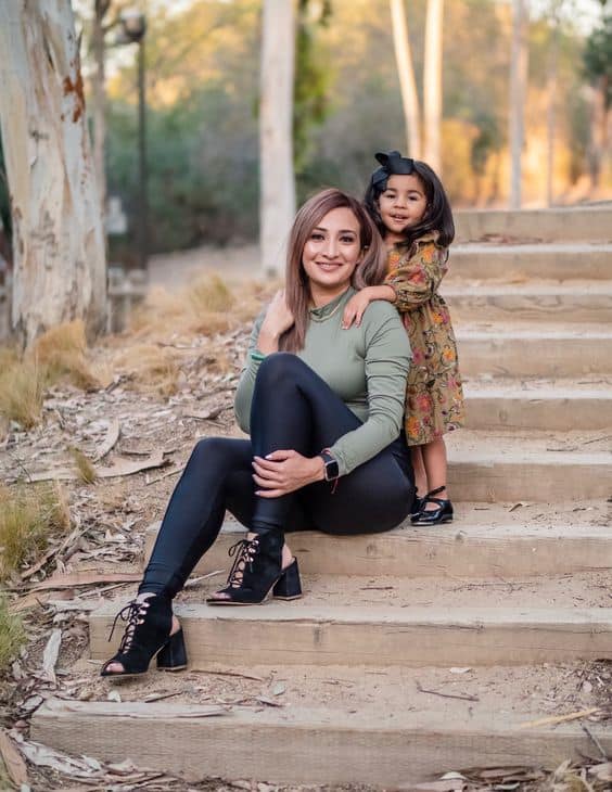 Mom and daughter on a staircase