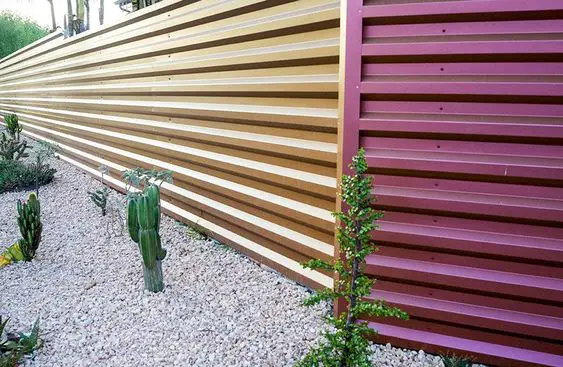 A corrugated metal fence