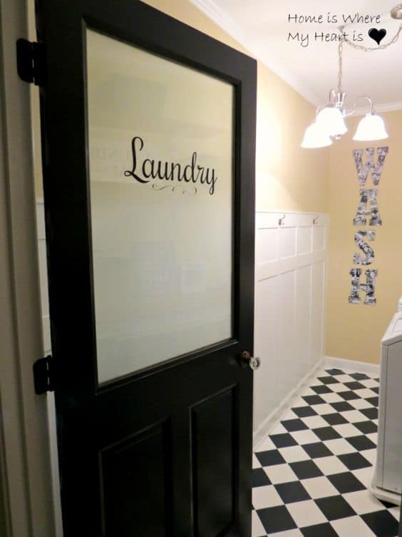 Black Door with Laundry Room Sign