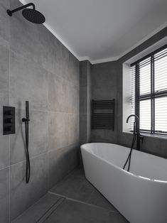 Gray Walls With White Bathtub