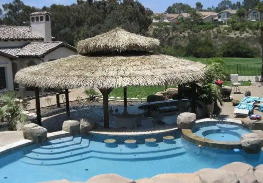 Thatched straw roof pool pavilion